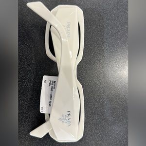 White Prada sunglasses. Comes with case/cloth/tag. They are brand new in box